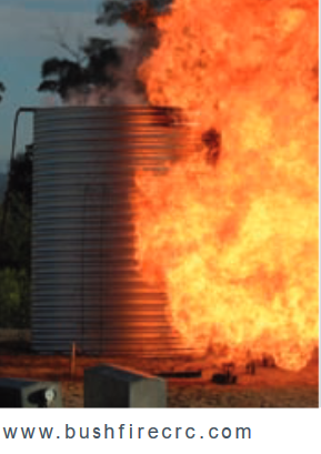 Steel rainwater tank with fire and flames around it