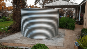 Galvanised Rainwater tank on concrete base